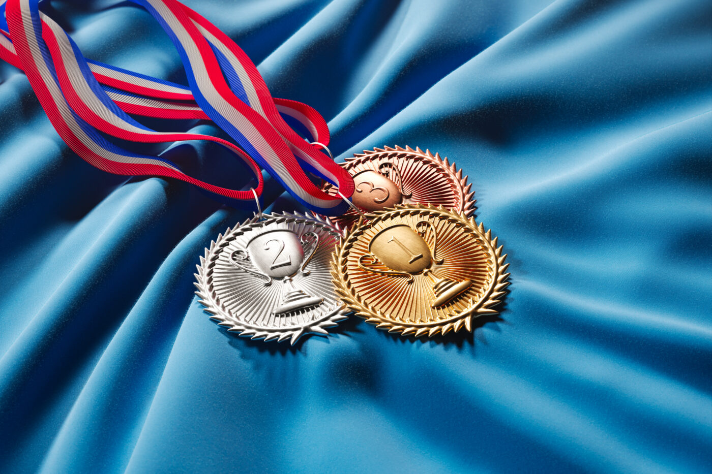 Set of gold, silver and brown medals for Olympic winners